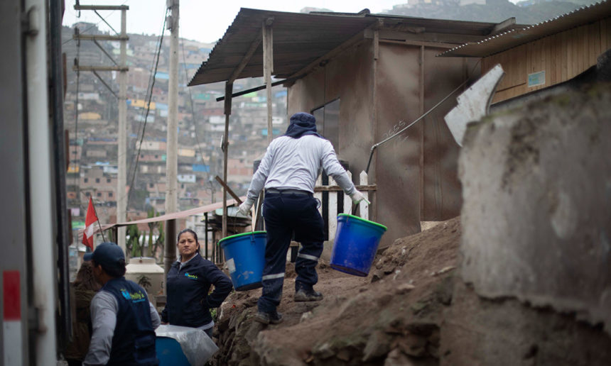 women with buckets